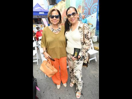 Carmen Brown-Morrow (right), owner of FurnitureLand and Karmen’s Kollection, and Cynthia ‘Cherry’ Cooke show off their spunky style.