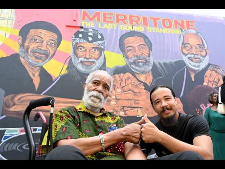 Monte Blake (left) and artist Yanque Yip at the unveiling of the Merritone Music Blake Family Mural at the Kingston Creative downtown art district on Water Lane.
