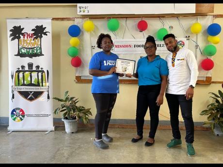 Founder Peter Ivey and Chef Patrice Harris Henry present Mission:FoodPossible certificates to  participants.