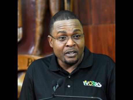 Robert Morgan, minister without portfolio in the Ministry of Economic Growth and Job Creation with responsibility for works, addresses yesterday’s post-Cabinet press briefing at Jamaica House in St Andrew. 