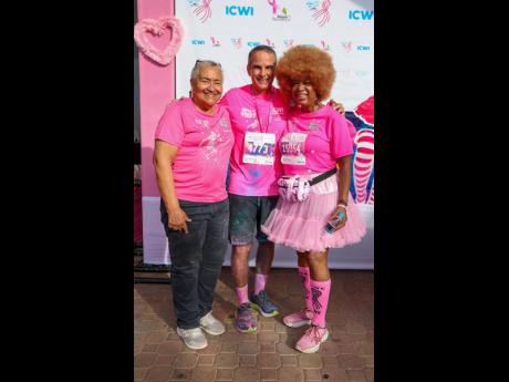 ICWI JR2R Pink Run 2024 United Thousands in Breast Cancer Support at their return to the Emancipation Park. (From left) Carolind Graham, chairperson, JR2R, Paul Lalor, president, ICWI, and Sandra Samuels, president, JR2R, are all smiles following the succe