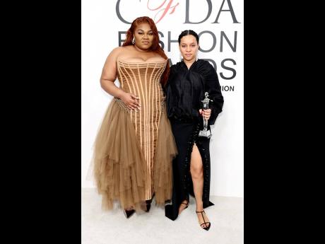 
Clad in Wiederhoeft, Da’Vine Joy Randolph (left), this year’s Academy Award winner for Best Supporting Actress, presented Scott with her award, and joined the designer for a post-event snap.
