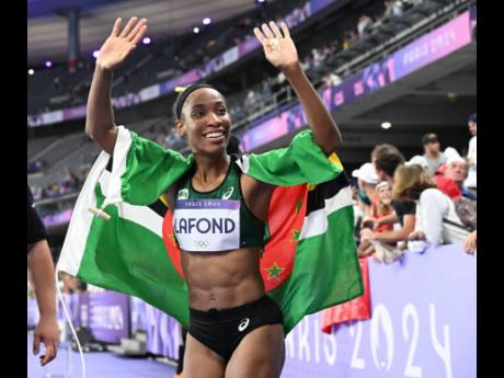 Credit: Gladstone Taylor Thea LaFond of Dominica, now LaFond-Gadson celebrates striking gold in the women’s triple jump at the Stade de France in Paris, France on August 3.