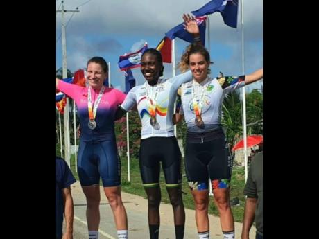 Credit: @llori_the_sharpest Jamaica’s Llori Sharpe (centre) celebrates winning the Elite Caribbean Championships women’s road race’s gold medal along with second-place Bermuda’s Gabriella Arnold (left), and Guadeloupe’s Berenice Paul in Guyana at the weekend.