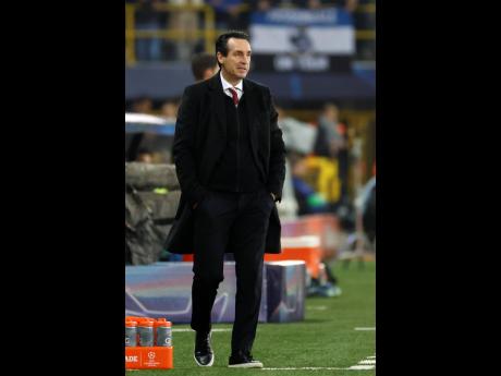 Credit: AP Aston Villa’s head coach Unai Emery watches the Champions League opening phase football match against Club Brugge at Jan Breydelstadion in Bruges, Belgium, yesterday.