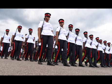Credit: Ian Allen/Photographer Some of the 129 constables of Batch 155 participating in the Passing Out Parade and Awards Ceremony at National Police College of Jamaica in St Catherine on October 3. Police officers face several health risks because of the high levels of stress associate