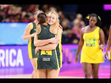 
South African players celebrate after winning their Fast5 World Series netball game against Jamaica on Friday night.