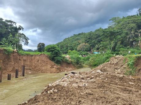 Construction work taking place on the new Troy Bridge on Friday afternoon.