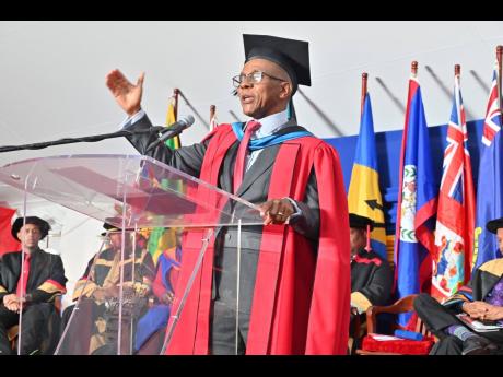 Credit: Contributed Courtney Campbell, VM group president and CEO, speaking to graduands following the conferral of an honorary Doctor of Laws (LLD) degree for his contributions as an entrepreneur and philanthropist by The UWI Mona campus on November 2.