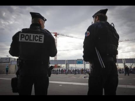 Credit: AP Police officers stand guard ahead of the UEFA Nations League match between France and Denmark at the Stade de France in Saint Denis near Paris, France, Friday, June 3, 2022.