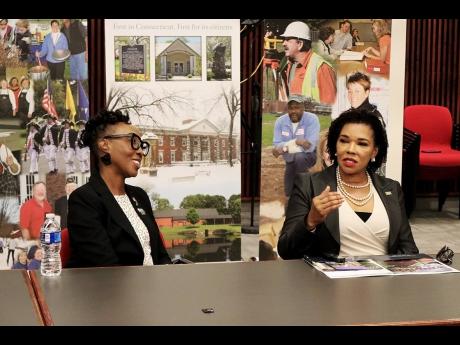 Jamaica’s Ambassador to the United States, Audrey Marks addresses members of the Windsor Town Council at its chamber on a recent visit to Windsor. At left, is mayor of the town of Windsor, Nuchette Black-Burke.