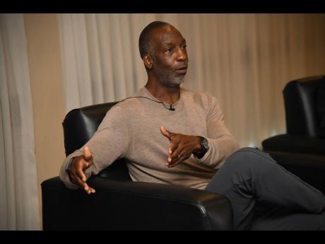 Four-time Olympic champion, Michael Johnson, founder of the Grand Slam Track series, speaks to the media during a press conference at The Jamaica Pegasus hotel yesterday.