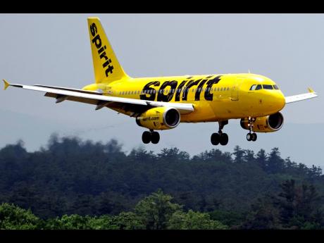 
A Spirit Airlines flight prepares for landing at Manchester Boston Regional Airport on June 2, 2023, in New Hampshire.