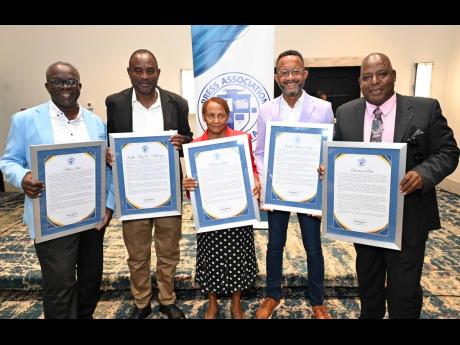 Press Association of Jamaica (PAJ) honorees (from left) Arthur Hall, Joseph Wellingston, Barbara Gayle, Neville Bell and Durrant Pate at the 2024 PAJ Veterans’ Luncheon held yesterday at The Jamaica Pegasus hotel in New Kingston.