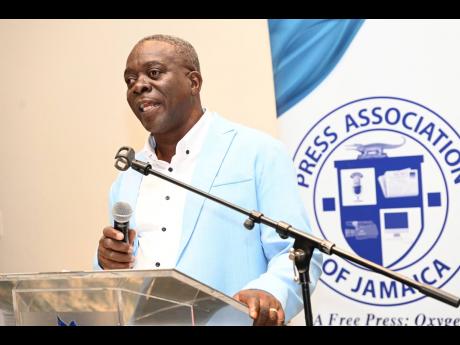 Press Association of Jamaica (PAJ) honoree Arthur Hall addresses the PAJ Veterans’ Luncheon.