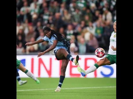 Credit: Courtesy of @mancitywomen Reggae Girl Khadija Shaw strikes to goal during a Champions League game for Manchester City against Hammarby at the Tele2 Arena in Stockholm, Sweden, yesterday.