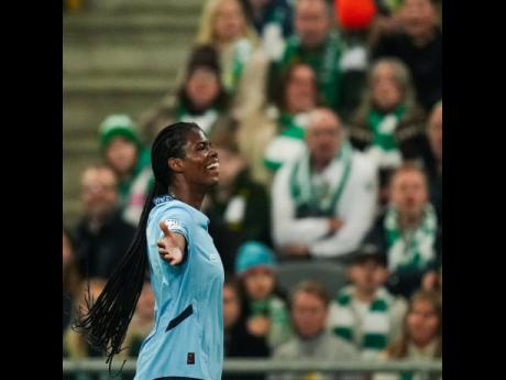 Credit: Courtesy of @mancitywomen Reggae Girl Khadija Shaw celebrates one of her two goals for Manchester City in a Champions League encounter against Swedish side Hammarby at the Tele2 Arena in Stockholm, yesterday.