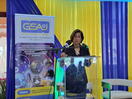 Sancia Bennett Templer, the Permanent Secretary in the Ministry of Industry, Investment and Commerce, addressing the Global Services Association of Jamaica’s [GSAJ] President’s Breakfast Forum at the Grand-a-View Event Place in Montego Bay on Thursday,