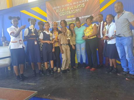 Credit: Rasbert Turner photo Some of the students honoured by Dinthill Technical High School and their parents.