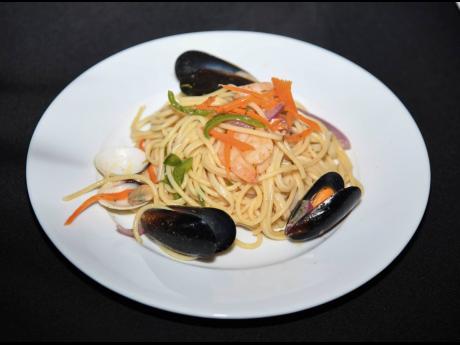 Credit: Antoine Lodge Guests were given a taste of the spaghetti alle vongole, made with shrimp, scallops, mussels and clams.