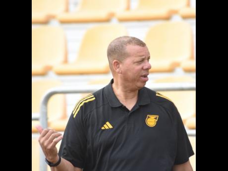 Reggae Girlz head coach Hubert Busby during a training session at the Montego Bay Sports Complex, yesterday.