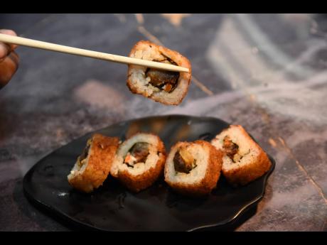 Credit: Ian Allen You have not lived until you have tried this cooked oxtail ‘sushi’.