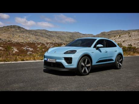 The all-electric Macan Turbo’s sleek silhouette hints at the performance lurking beneath its skin.
