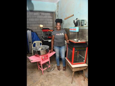 Sophia Granville shows off some of her rental equipment for her business, Party Pantry.