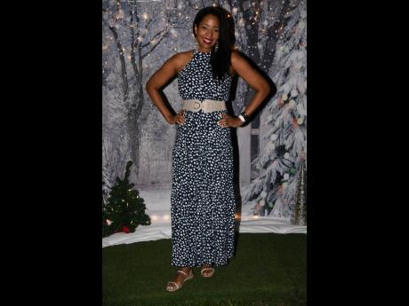 Kashta Graham, chief executive officer at We Manage Trust, donned a halter polka dot maxi for the occasion, cinching her waist with a nude broad belt and matching sandals. 