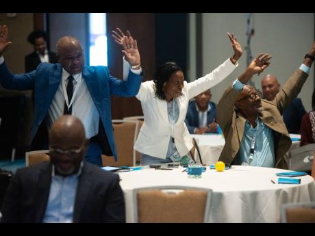 Jamaican Customs Brokers team acknowledge their presence at the opening of Connected Caribbean Summit in Miami. (From left are) Clive Coke, immediate past president of the Customs Brokers and Freight Forwarders Association of Jamaica (CBFFAJ), Vice-Preside