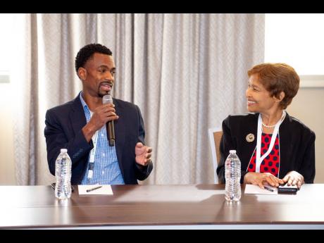 Sean Hinds, manager of User Experience at Teleios Systems,  Trinidad and Tobago, with Bernadette Lewis, secretary general of the London-based Commonwealth Telecommunications Organisation during the APEX Academy Masterclass on Artificial Intelligence at the