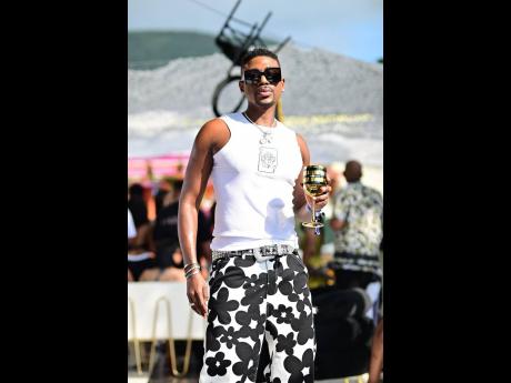 Credit: Contributed Influencer Markie Markland is spotted in casual black and white.