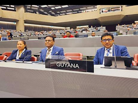 Attorney general, Anil Nandlall (far right) at IPU Assembly in Geneva.