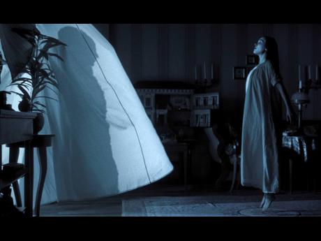 This image released by Focus Features shows Lily-Rose Depp in a scene from ‘Nosferatu’.