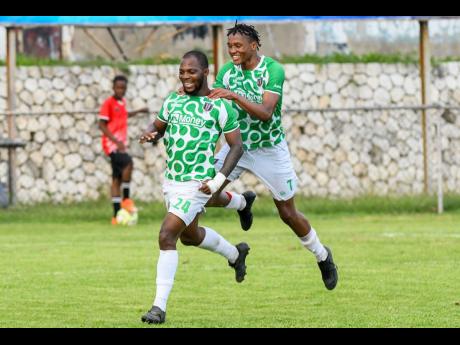 Credit: Matthew Mckoy File photos
Shaquille Jones (left) and Javel Ellis celebrate the former’s goal against Chapelton Maroons at the Anthony Spaulding Sports Centre on Monday, December 1, 2024.
