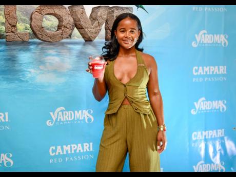 Shanice Mitchell, Campari’s brand activator, dons an army green vest co-ord.