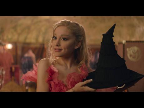 This image released by Universal Pictures shows Ariana Granda as Glinda in the film 'Wicked'. 