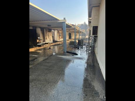 Credit: AP Damage from wildfires is seen at the Palisades Charter High School campus in the Pacific Palisades neighbourhood of Los Angeles, California, January 9, 2025.