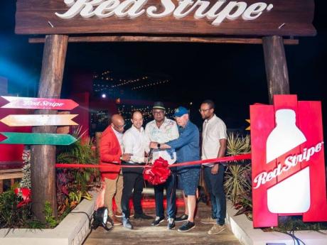 Tourism Minister Edmund Bartlett was speaking at the grand opening of the Red Stripe Experience at Rick's Café, on Saturday. - Contributed photo
