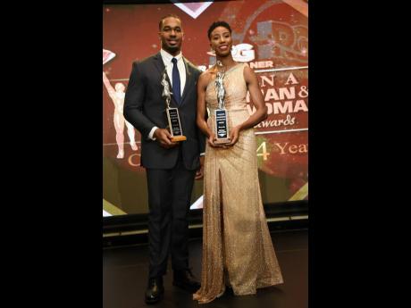 The RJRGLEANER National Sportsman and Sportswoman of the Year, discus thrower Roje Stona (left) and triple jumper Shanieka Ricketts, posing after receiving their awards on Friday.