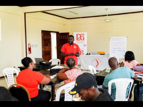 Red Stripe’s Extension Lead Devarn Breakenridge leads an informative session on crop and production planning for farmers in St Thomas, as part of the D&G Foundation’s Farmers’ Training Initiative.