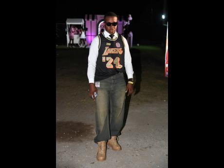 Adrian Johnson, a basketball enthusiast, reps Team Lakers.