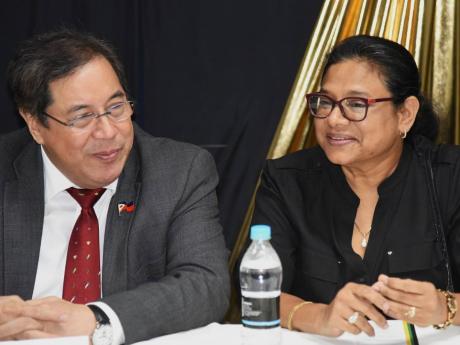 Secretary of Health for the Republic of the Philippines, Dr Teodoro J. Herbosa, in conversation with Chief Medical Officer (CMO) in the Ministry of Health and Wellness, Dr Jacquiline Bisasor-McKenzie, at the Bustamante Hospital for Children on January 21. 