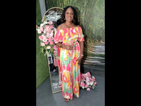 Credit: Rudolph Brown Above: Kemar Letman, celebrating her 40th birthday and sister of the event’s organiser, looked fabulous in a printed jumpsuit she bought locally from Closet Cloud.