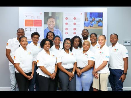 Credit: Contributed Some of Flow’s safety monitors who participated in the Earthquake Awareness Month safety workshop.