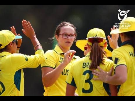 
Australia Under-19 Women celebrate a West Indies wicket during the Under-19 Women’s World Cup Super Sixes game at the YSD-UKM Cricket Oval in Kuala Lumpur, Malaysia yesterday.