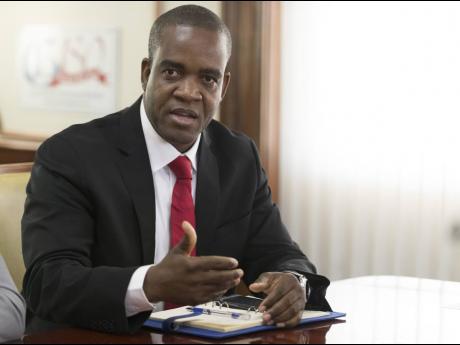 Dr Kevin Blake, commissioner of police.  