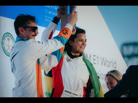 Sara-Misir (right) and teammate John Peeters on the podium.