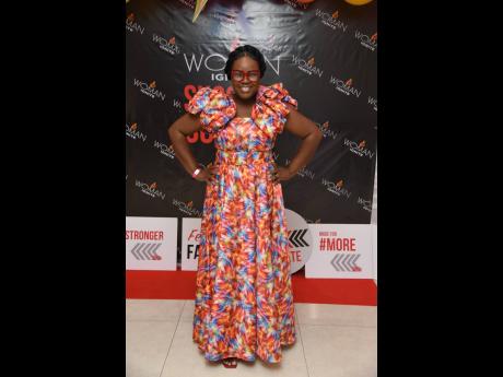 Credit: Antoine Lodge Gracefully leading out the day’s proceedings, Ava-Gay Blair Black, radio personality, stuns in a colourful dress with ruffled puff sleeves, which she says was locally made.