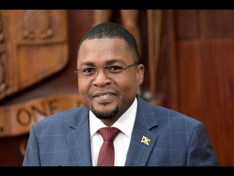 Minister without Portfolio in the Ministry of Economic Growth and Job Creation with the Responsibility for Works, Robert Morgan.